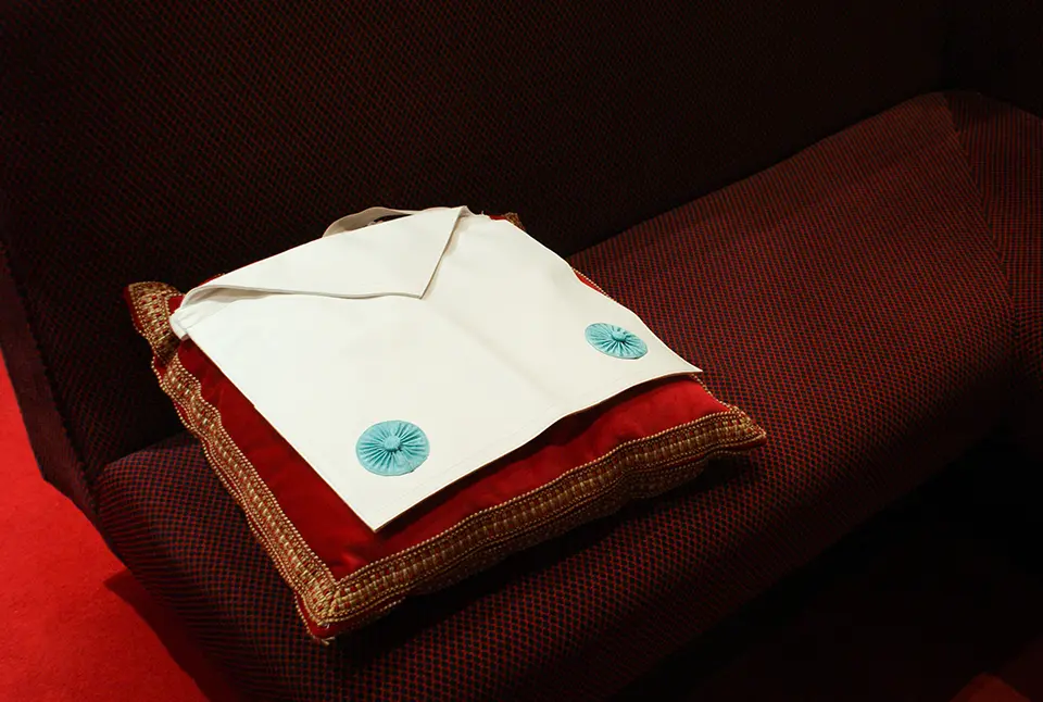 Traditional Freemason's apron representing the values, heritage, and commitment in Freemasonry membership